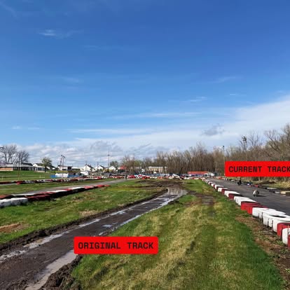 At Boschertown Go Karts in St. Charles, the grassy and muddy track areas are split—red labels show the ORIGINAL TRACK on the left, now unused, while Go Karts race along the CURRENT TRACK curving ahead under a blue sky.